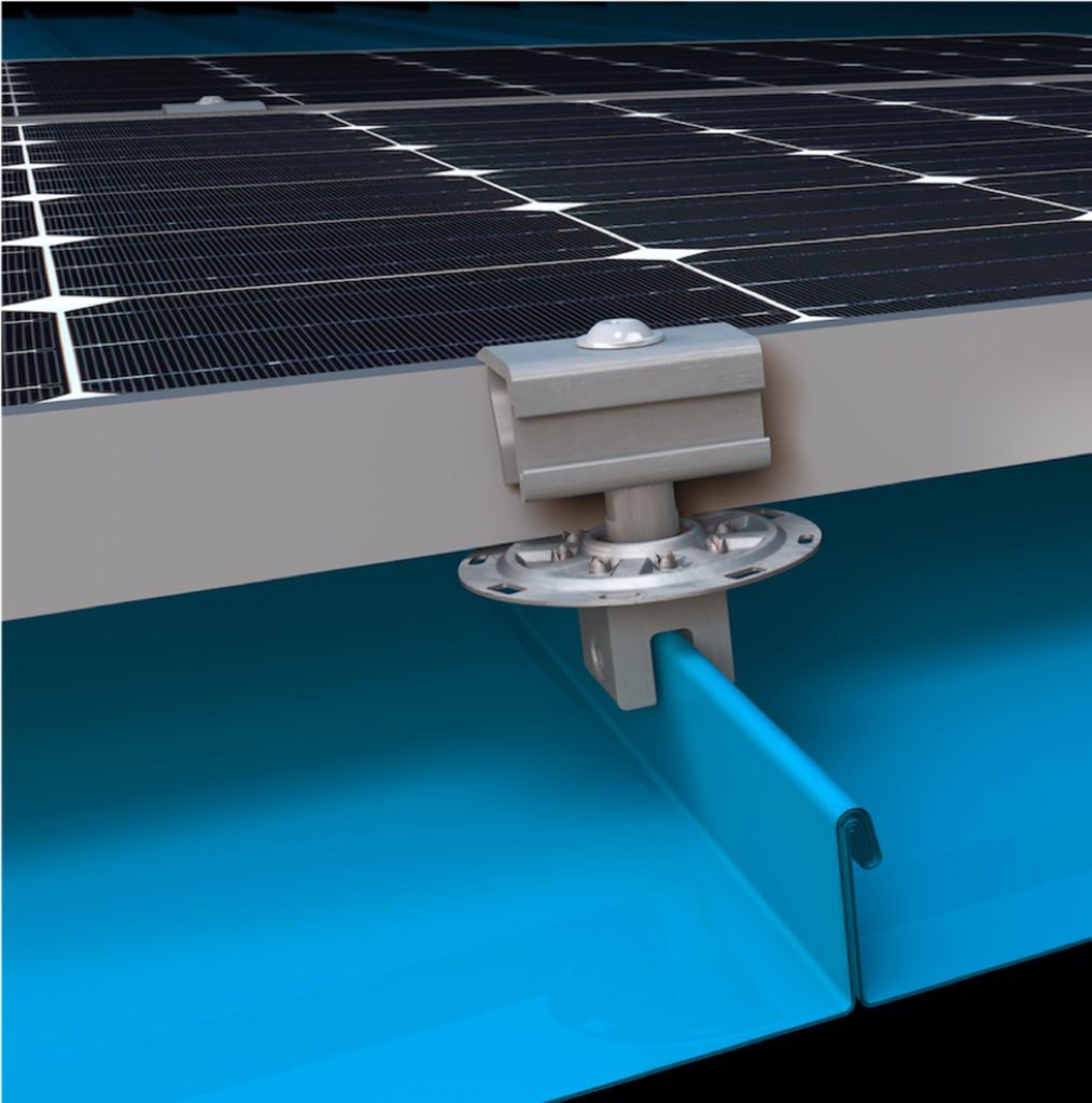 Metallic mounting bracket securing a solar panel to a blue standing seam metal roof.